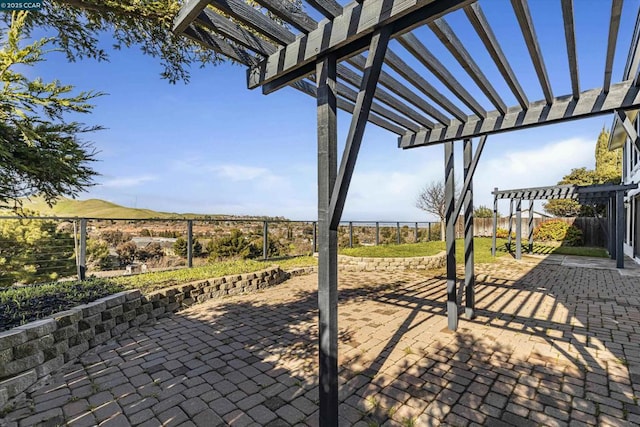 view of patio / terrace featuring a pergola