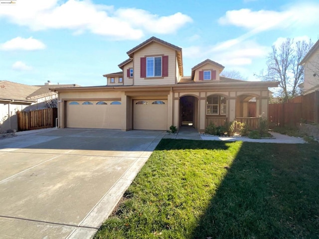 view of front of home with a garage, a front lawn, and covered porch