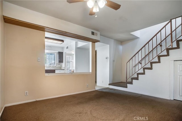 interior space featuring ceiling fan