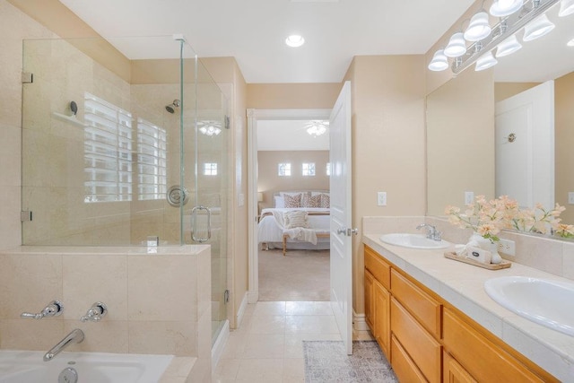 bathroom featuring vanity, tile patterned floors, and plus walk in shower