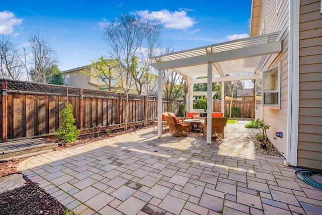 view of patio featuring an outdoor fire pit and a pergola