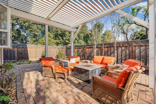 view of patio featuring an outdoor living space with a fire pit and a pergola