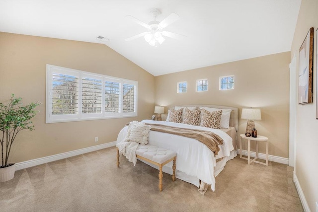 carpeted bedroom featuring lofted ceiling and ceiling fan