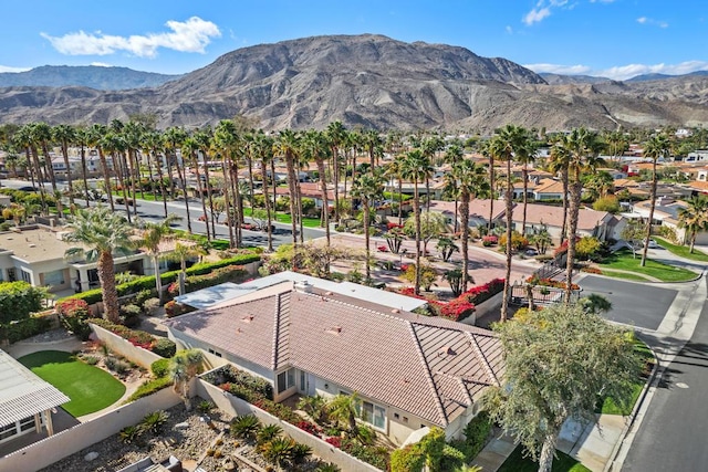 birds eye view of property featuring a mountain view