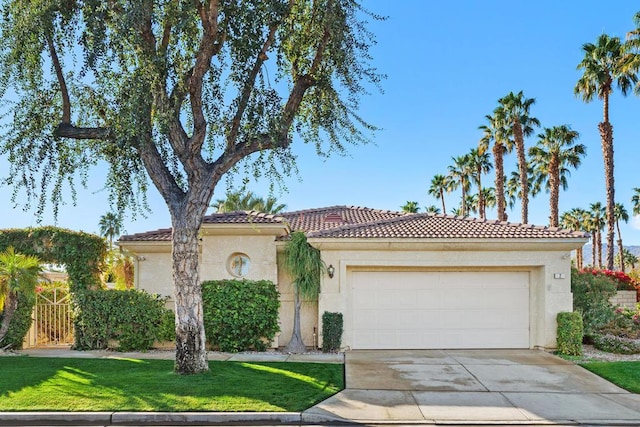 mediterranean / spanish-style house featuring a garage