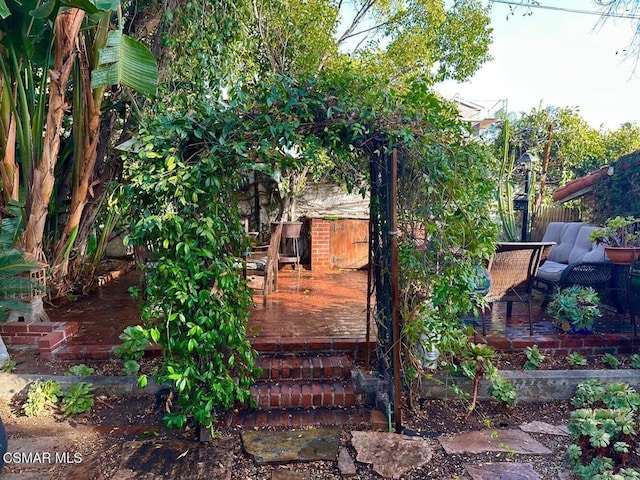 view of yard featuring a wooden deck