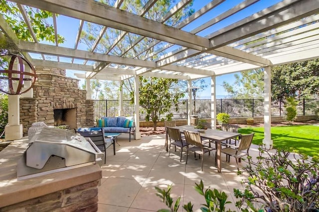 view of patio with a pergola and an outdoor living space with a fireplace