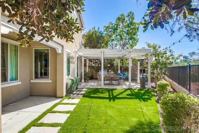 view of yard featuring a pergola and a patio