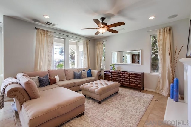 living room with ceiling fan