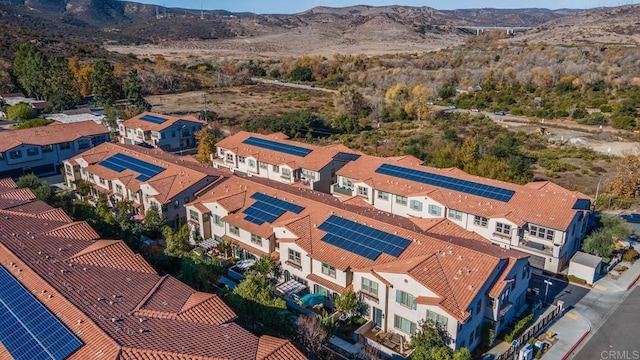 drone / aerial view featuring a mountain view