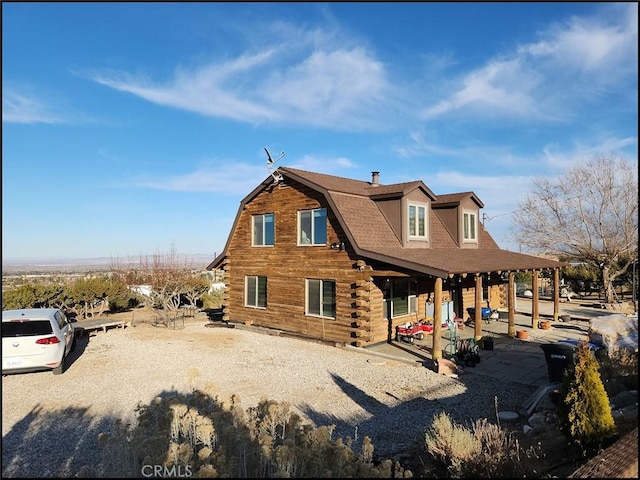 view of front of home with a patio