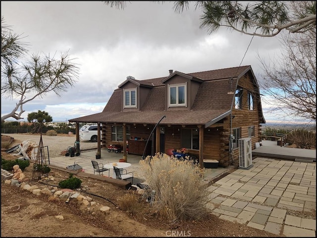 back of house featuring a patio