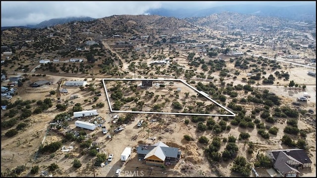 aerial view featuring a mountain view