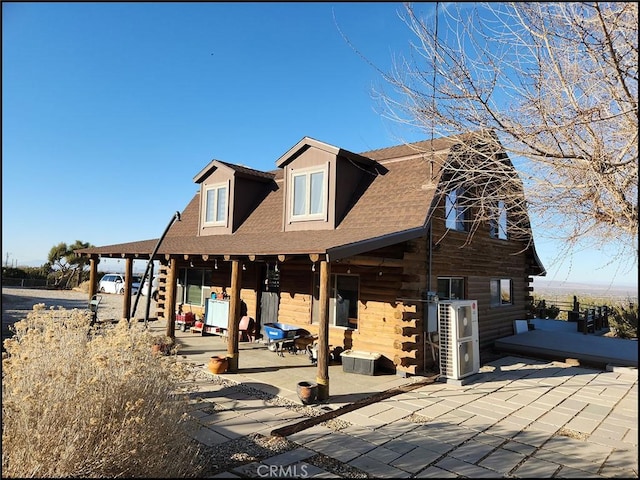 view of front of house featuring a patio