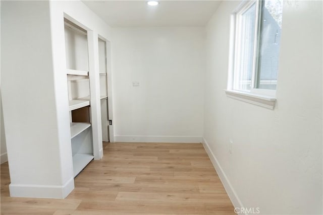 hallway featuring light hardwood / wood-style floors