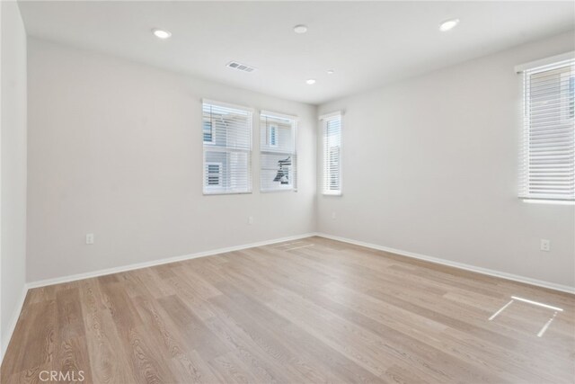 2718 Crozier Ct, Pomona, CA 91767 - spare room featuring light wood-type flooring, baseboards, and recessed lighting