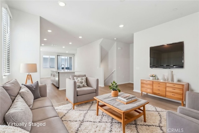 2718 Crozier Ct, Pomona, CA 91767 - living room with light wood finished floors and recessed lighting