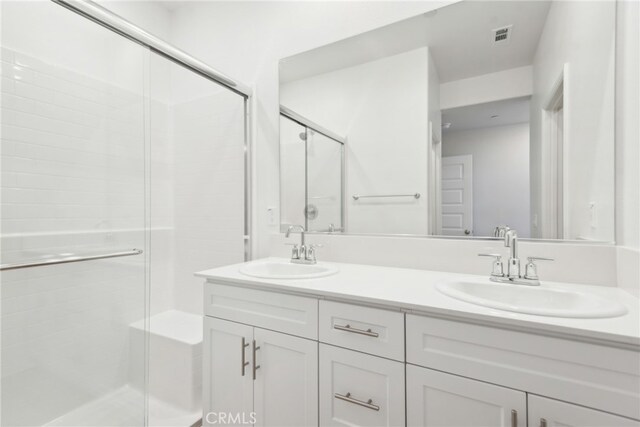 2718 Crozier Ct, Pomona, CA 91767 - bathroom with double vanity and a stall shower