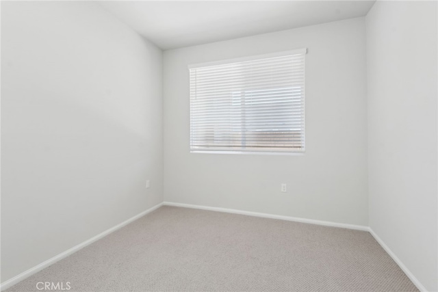 2718 Crozier Ct, Pomona, CA 91767 - carpeted empty room featuring baseboards