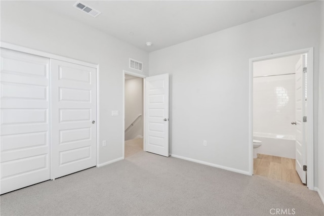 2718 Crozier Ct, Pomona, CA 91767 - unfurnished bedroom with carpet flooring, a closet, ensuite bath, and baseboards