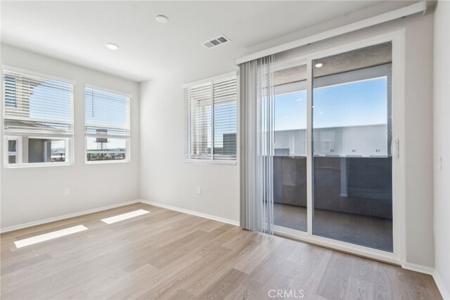 2718 Crozier Ct, Pomona, CA 91767 - unfurnished room featuring wood finished floors and baseboards