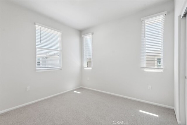 2718 Crozier Ct, Pomona, CA 91767 - carpeted spare room featuring baseboards and healthy amount of natural light