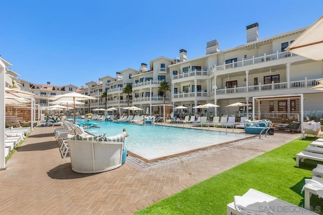 view of pool featuring a patio area