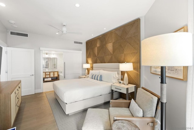 bedroom featuring ceiling fan and light wood-type flooring