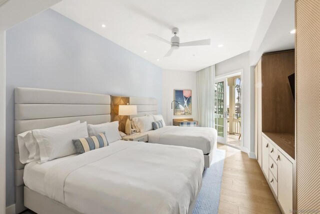 bedroom featuring access to outside, ceiling fan, and light wood-type flooring