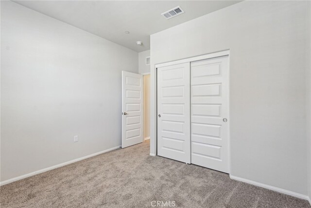 2720 Crozier Ct, Pomona, CA 91767 - unfurnished bedroom with carpet, a closet, and baseboards