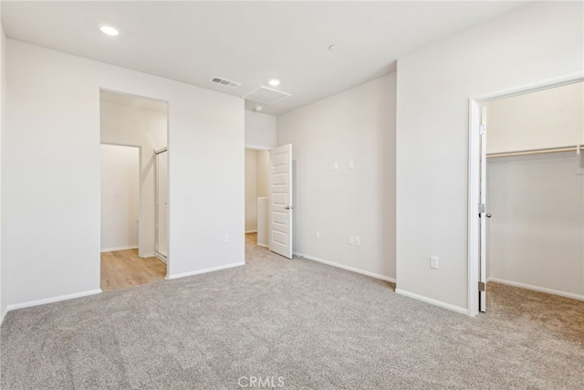 2720 Crozier Ct, Pomona, CA 91767 - unfurnished bedroom with carpet flooring, a walk in closet, baseboards, recessed lighting, and a closet
