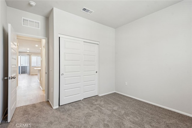 2720 Crozier Ct, Pomona, CA 91767 - unfurnished bedroom with carpet flooring, baseboards, and a closet
