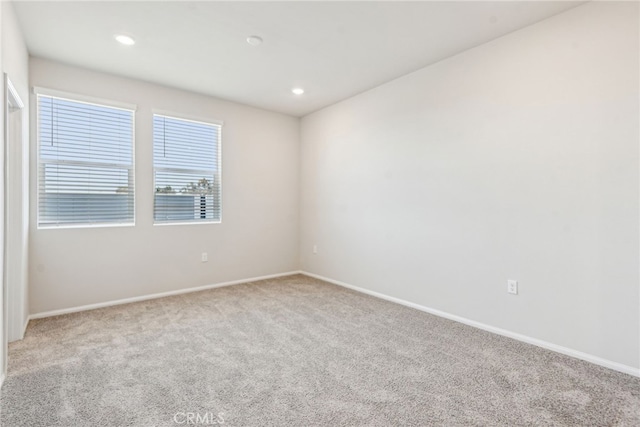 2720 Crozier Ct, Pomona, CA 91767 - unfurnished room with light colored carpet, baseboards, and recessed lighting