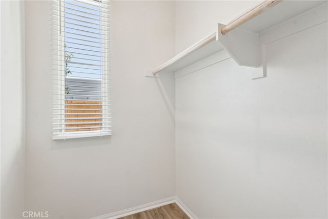 2720 Crozier Ct, Pomona, CA 91767 - spacious closet featuring wood finished floors