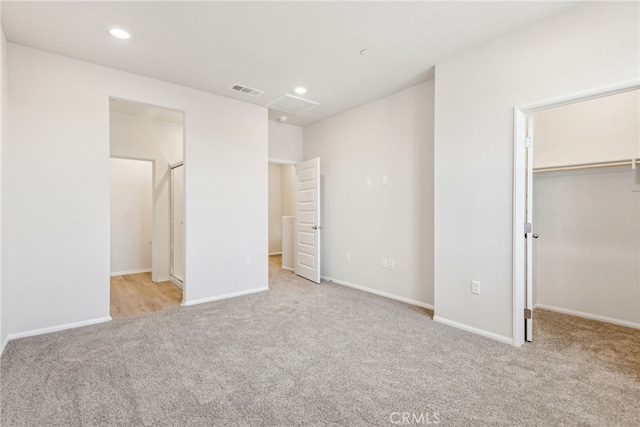 2720 Crozier Ct, Pomona, CA 91767 - unfurnished bedroom featuring carpet floors, a walk in closet, baseboards, recessed lighting, and a closet