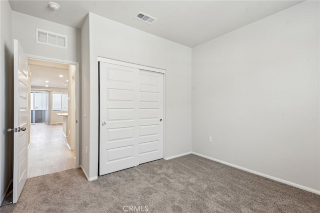 2720 Crozier Ct, Pomona, CA 91767 - unfurnished bedroom featuring carpet flooring, a closet, and baseboards