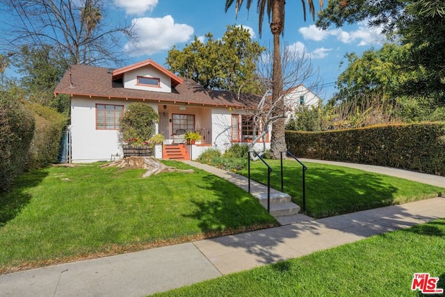 view of front of house with a front yard