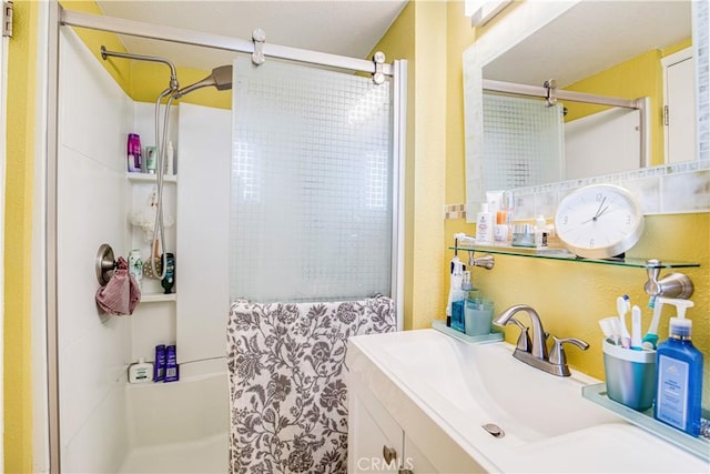 bathroom with vanity and a shower with shower curtain