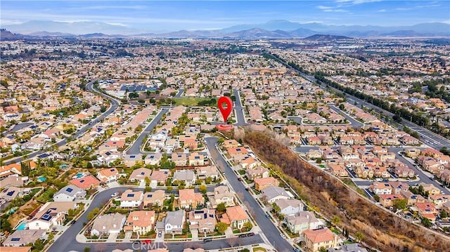 drone / aerial view featuring a mountain view