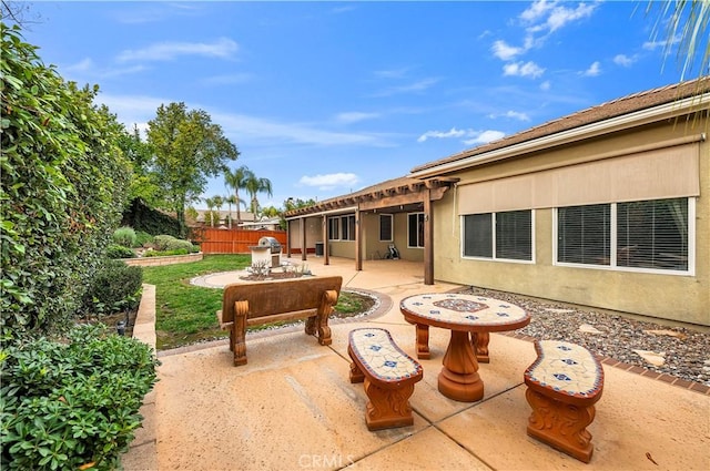 view of patio / terrace featuring an outdoor fire pit