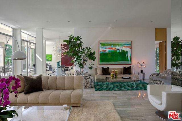 living room featuring floor to ceiling windows and wood-type flooring