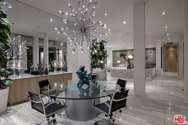 dining area with a notable chandelier