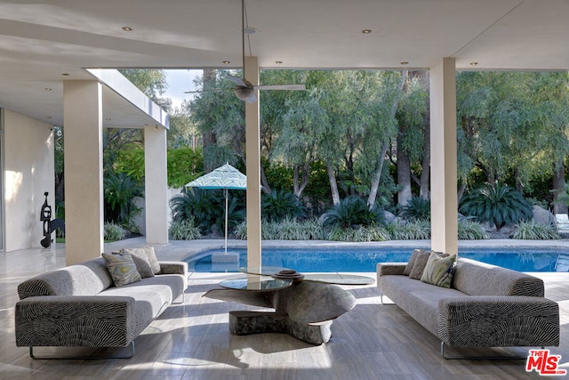 view of swimming pool featuring outdoor lounge area and a patio area