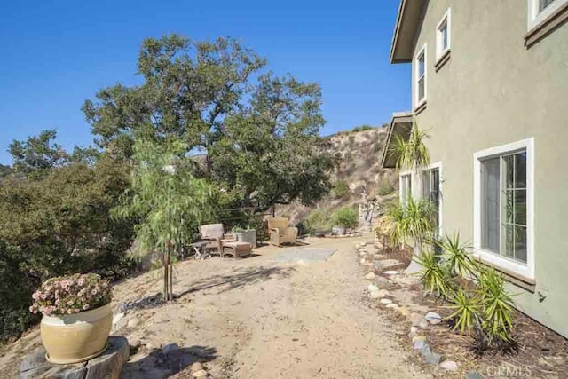 view of yard with a patio area