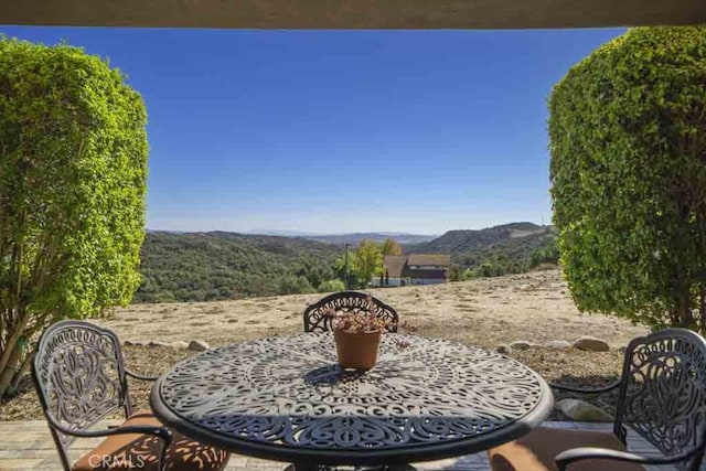 view of patio featuring a mountain view