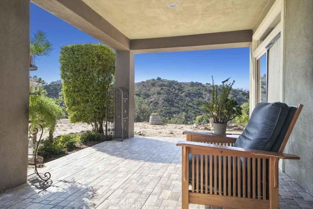 view of patio featuring a mountain view