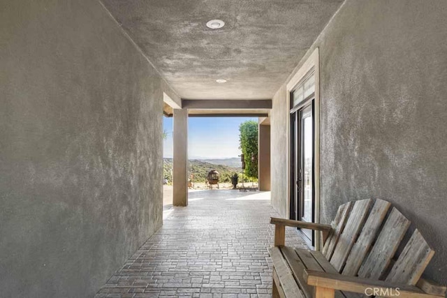 hallway with a mountain view