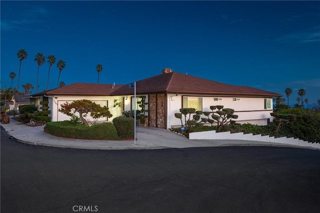 ranch-style home with a garage