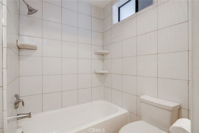 bathroom featuring toilet and  shower combination