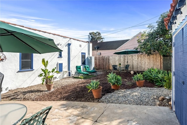 exterior space with a patio area